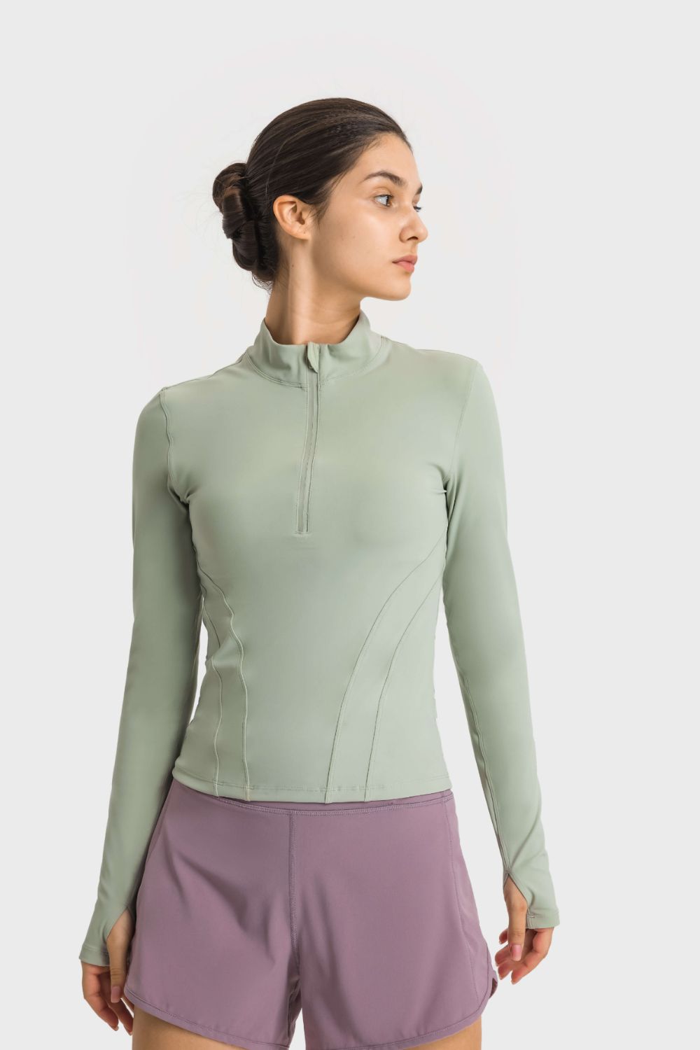 Buy green Millennia Half Zip Thumbhole Sleeve Sports Top